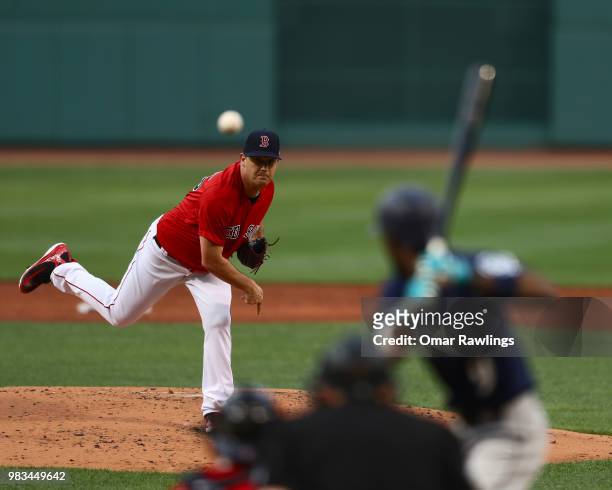 Steven Wright of the Boston Red Sox pitches at the top of the second inning of the game against the Seattle Mariners at Fenway Park on June 22, 2018...