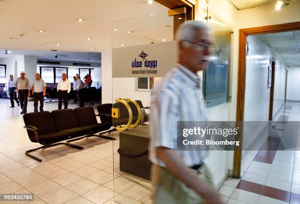 Investors leave the floor at the Amman Stock Exchange at the Housing Bank Complex in Amman, Jordan, on Thursday, June 21, 2018. President Trump and...