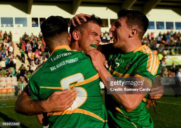 Carrick-on-Shannon , Ireland - 23 June 2018; Leitrim players, from left, James Rooney, Donal Wrynn and Jack Heslin celebrate following the GAA...