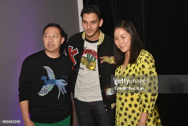 Designer Humberto Leon, Amir El Kacem and designer Carol Lim attend the Kenzo Menswear /womenswear Spring/Summer 2019 show as part of Paris Fashion...