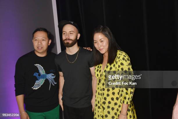 Designer Humberto Leon, Woodkid and designer Carol Lim attend the Kenzo Menswear /womenswear Spring/Summer 2019 show as part of Paris Fashion Week on...