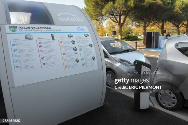 Bluecars are pictured near a station at the Autolib operational Center in Vaucresson, near Paris, on September 30, 2011 during a presentation of the...