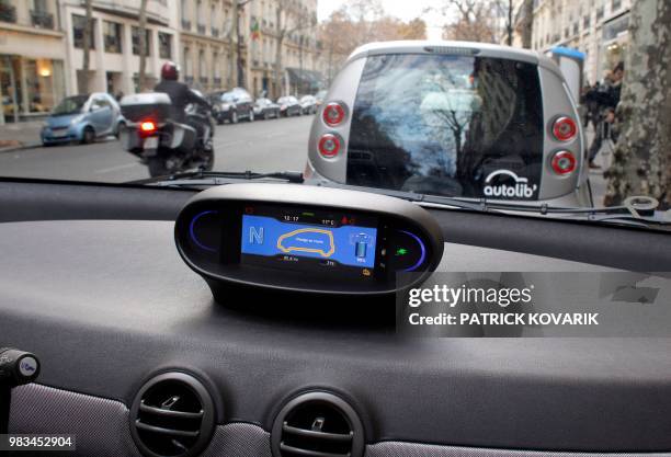 Picture taken from the passenger cell of an Autolib electric bluecar on December 2, 2011 in Paris, on the day of the official presentation of this...