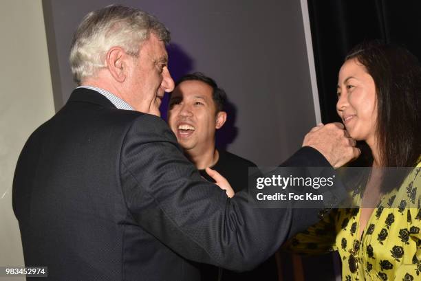 Designer Humberto Leon , Sydney Toledano, and designer Carol Lim attend the Kenzo Menswear /womenswear Spring/Summer 2019 show as part of Paris...