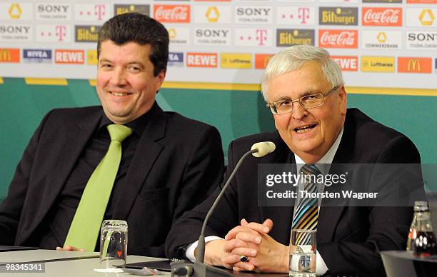 New head of referee Herbert Fandel and president of German Football Association Theo Zwanziger smiles during the German Football Association...