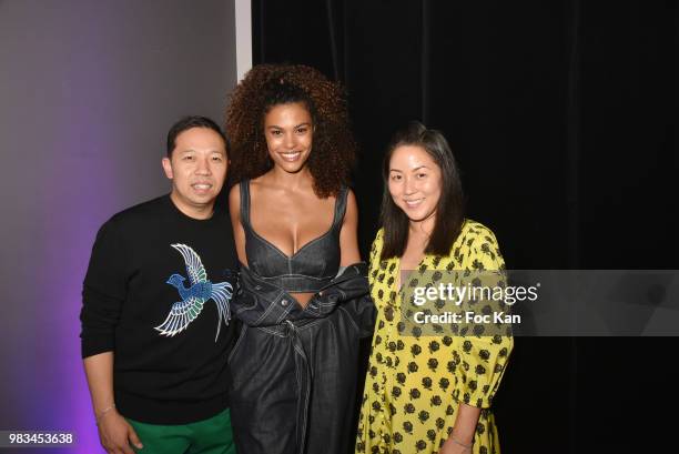 Designer Humberto Leon, Tina Kunakey and designer Carol Lim attend the Kenzo Menswear /womenswear Spring/Summer 2019 show as part of Paris Fashion...