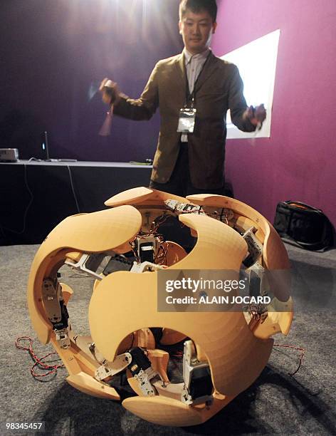 Person presents the "Column gear" a ball robot created by three students of the Toyohashi University of Technology in Japan on April 7, 2010 in...