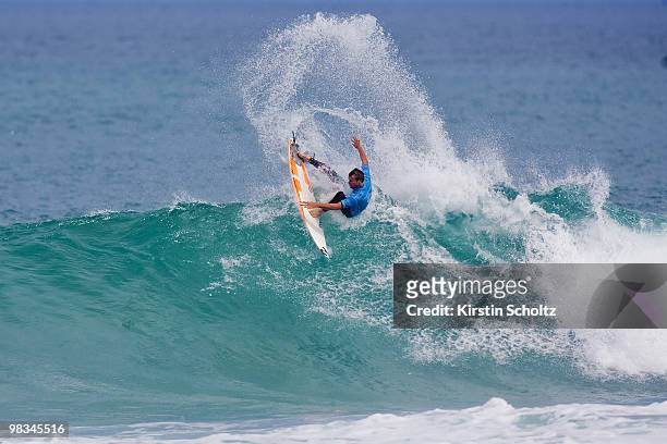 Taj Burrow of Australia surfs on April 9, 2010 in Johanna, Australia.