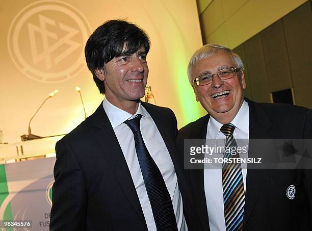 President of the German football association Theo Zwanziger and Germany's head coach Joachim Loew pose after the extraordinary meeting of the DFB in...