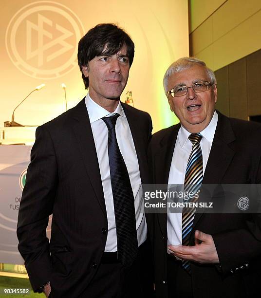 President of the German football association Theo Zwanziger and Germany's head coach Joachim Loew pose after the extraordinary meeting of the DFB in...