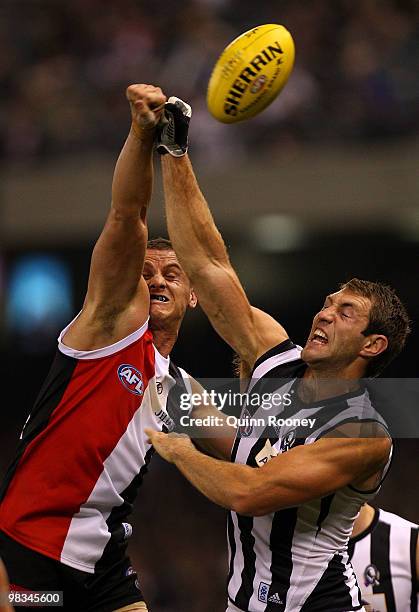 Michael Gardiner of the Saints and Travis Cloke of the Magpies compete in the ruck during the round three AFL match between the St Kilda Saints and...