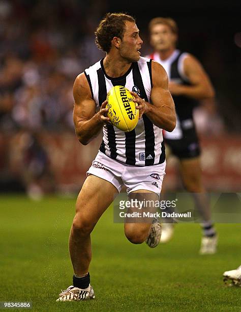 Brent McCaffer of the Magpies looks for a teammate during the round three AFL match between the St Kilda Saints and the Collingwood Magpies at Etihad...