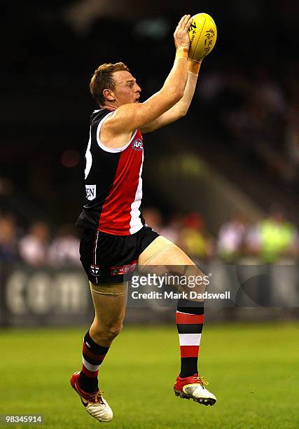 Brendon Goddard of the Saints gathers the ball during the round three AFL match between the St Kilda Saints and the Collingwood Magpies at Etihad...