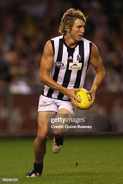 Dale Thomas of the Magpies looks to kick the ball during the round three AFL match between the St Kilda Saints and the Collingwood Magpies at Etihad...