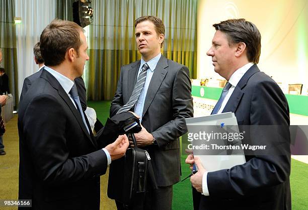 Manager Oliver Bierhoff talks to second coach Hans Dieter Flick during the German Football Association Bundestag at the Steigenberger Airport Hotel...