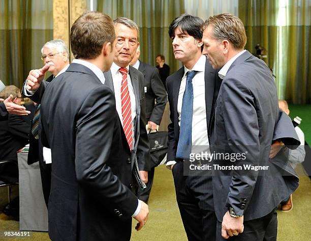 Hans Dieter Flick, Wolfgang Niersbach, Joachim Loew and Andreas Koepke talk during the German Football Association Bundestag at the Steigenberger...