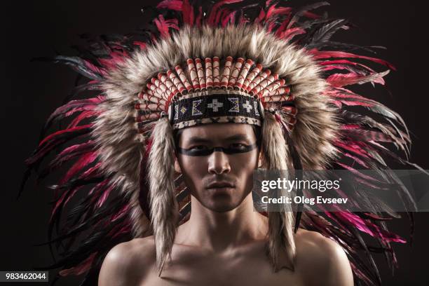 portrait of the indian strong man posing with traditional native american make up - black cockroach stock pictures, royalty-free photos & images