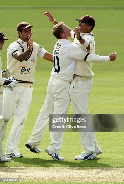 Gareth Batty and Andre Nel of Surrey celebrate the wicket of Garry Park of Derbyshire during the LV County Championship, Division two match between...