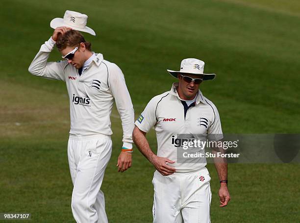 Middlesex fielders Dawid Malan and Andrew Strauss endure a long day in the field on the first day of the LV County Championship Division two match...