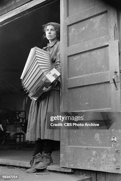 American actress Christine Baranski plays an accordion in a scene from the made-for-televsion film 'Playing for Time,' directed by Daniel Mann &...