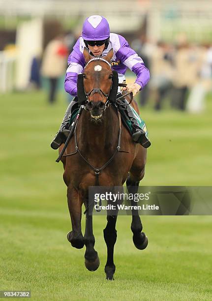 Brian Hughes rides Always Waining to victory in The John Smith's Topham Steeple Chase at Aintree racecourse on April 9, 2010 in Liverpool, England.