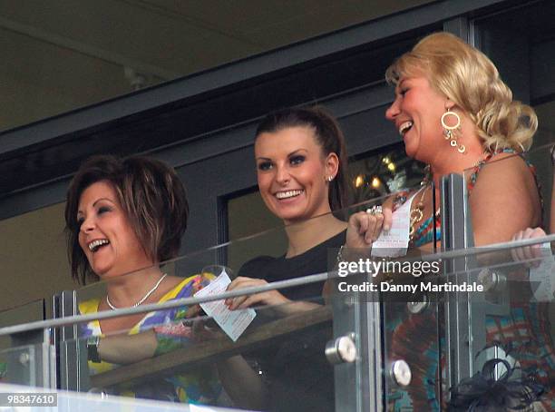 Coleen Rooney and friends attend John Smith's Grand National Ladies Day at Aintree Racecourse on April 9, 2010 in Liverpool, England.