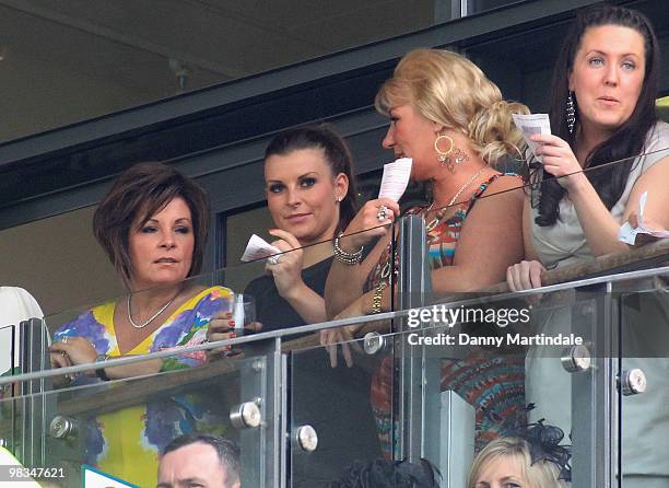 Coleen Rooney and friends attend John Smith's Grand National Ladies Day at Aintree Racecourse on April 9, 2010 in Liverpool, England.