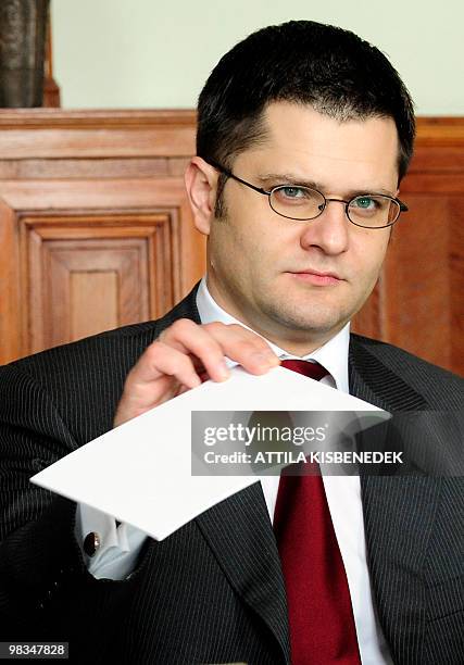 Serbian Foreign Minister Vuk Jeremic prepares for a meeting with his counterparts Peter Balazs of Hungary and Gordan Jandrokovic of Croatia in the...