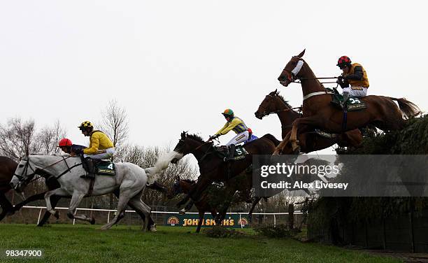 Pasco ridden by Ruby Walsh and Gaora Lane ridden by Brian Harding jump Becher's Brook during the The John Smith's Topham Steeple Chase at Aintree...