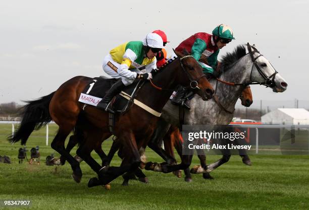 Burton Port ridden by Barry Geraghty during their victory in The matalan.co.uk Mildmay Novices' Steeple Chase at Aintree Racecourse on April 9, 2010...