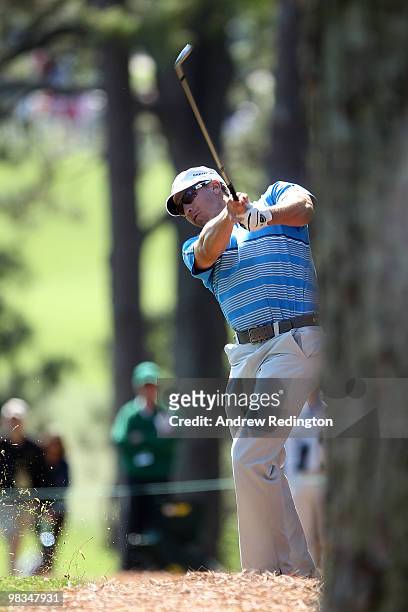 Ricky Barnes hits a shot on the first hole during the second round of the 2010 Masters Tournament at Augusta National Golf Club on April 9, 2010 in...