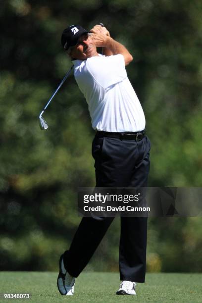 Fred Couples hits his approach shot on the fifth hole during the second round of the 2010 Masters Tournament at Augusta National Golf Club on April...