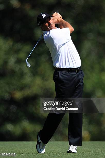 Fred Couples hits his approach shot on the fifth hole during the second round of the 2010 Masters Tournament at Augusta National Golf Club on April...