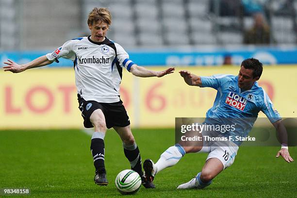 Alexander Ludwig challenges Ruediger Kauf of Bielefeld during the Second Bundesliga match between TSV 1860 Muenchen and Arminia Bielefeld at the...