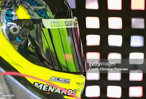 Paul Menard, driver of the K-Automotive Dodge, in his car during practice for the NASCAR Nationwide Series Bashas' Supermarkets 200 at Phoenix...