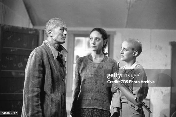 American actresses Marisa Berenson and Anna Levine watch British actress Vanessa Redgrave in a scene from the made-for-televsion film 'Playing for...