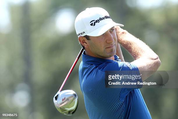 Dustin Johnson hits his tee shot on the first hole during the second round of the 2010 Masters Tournament at Augusta National Golf Club on April 9,...
