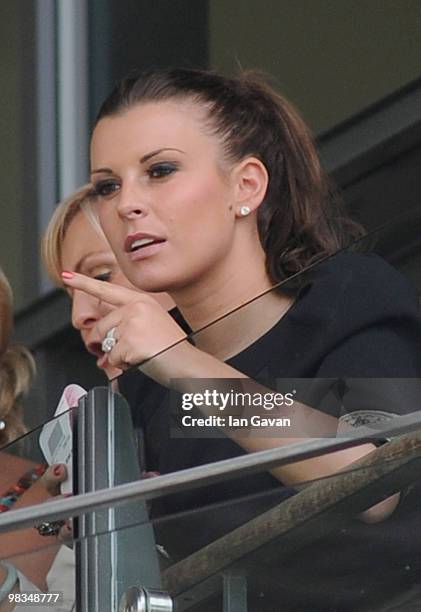 Coleen Rooney attends Ladies' Day at Aintree Racecourse on April 9, 2010 in Liverpool, England.