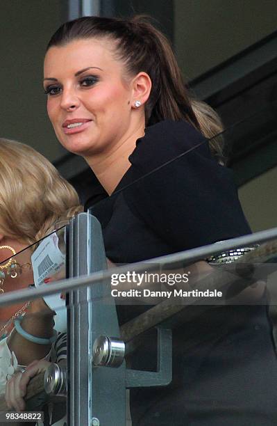 Coleen Rooney attends John Smith's Grand National Ladies Day at Aintree Racecourse on April 9, 2010 in Liverpool, England.