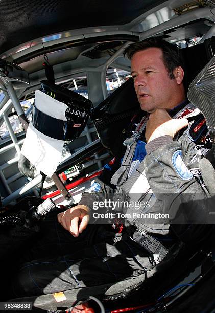 Robby Gordon, driver of the Blake Shelton/Warner Music Nashville Toyota, in his car during practice for the NASCAR Sprint Cup Series Subway Fresh Fit...