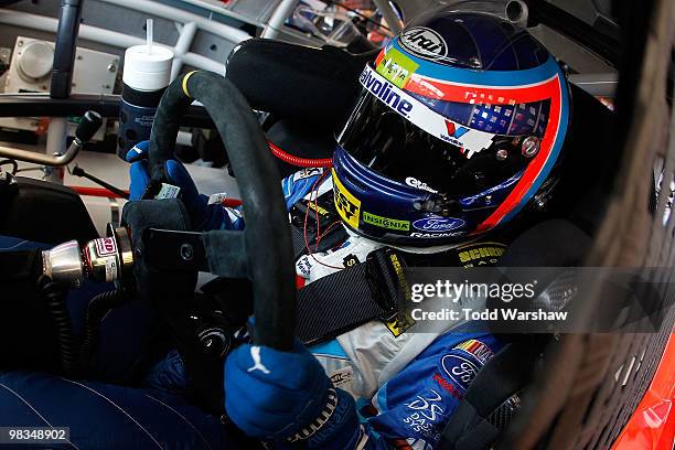 Allmendinger, driver of the Valvoline Ford, in his car during practice for the NASCAR Sprint Cup Series Subway Fresh Fit 600 at Phoenix International...
