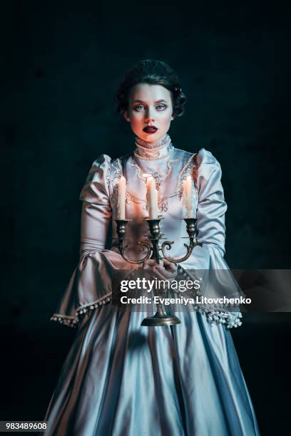 woman in victorian dress - victorian gown stock pictures, royalty-free photos & images