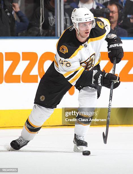 David Krejci of the Boston Bruins skates with the puck in a game against the Toronto Maple Leafs on April 3, 2010 at the Air Canada Centre in...