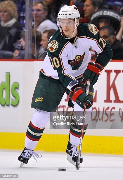 Antti Miettinen of the Minnesota Wild carries the puck up ice during the NHL game against the Vancouver Canucks on April 04, 2010 at General Motors...