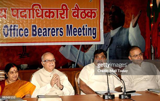 President Nitin Gadkari with senior leaders L K Advani, Sushma Swaraj and Arun Jaitley during party office bearers meeting at party head-office in...