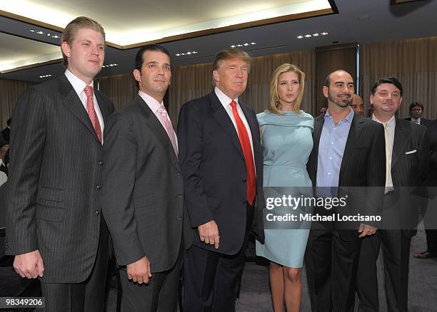 Donald Trump , and children Eric Trump, Donald Trump Jr., and Ivanka Trump, and hotel developers Alex Sapir and Julius Schwartz attend the ribbon...