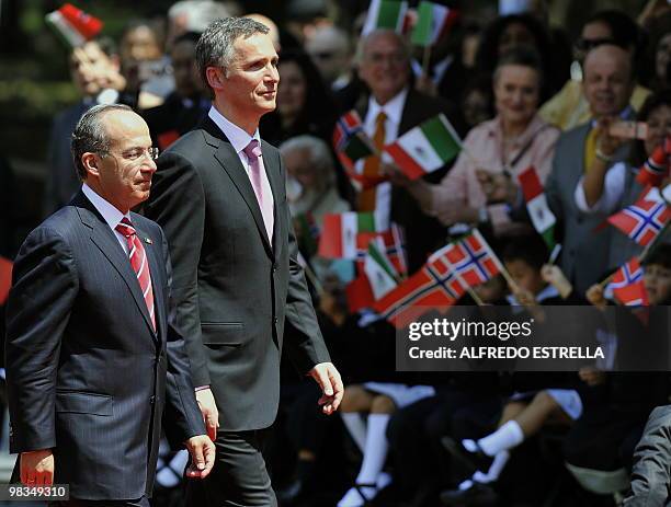 Norwegian Prime Minister Jens Stoltenberg and Mexican President Felipe Calderon take part in a welcome ceremony at Los Pinos Residence in Mexico...