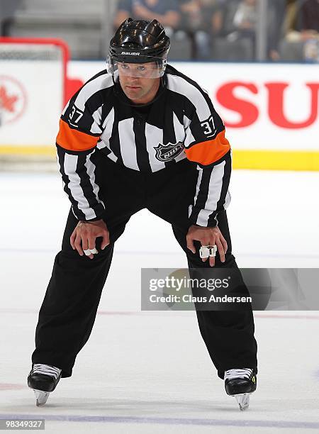 Referee Kyle Rehman waits for a play to start in a game between the Boston Bruins and the Toronto Maple Leafs in a game on April 3, 2010 at the Air...