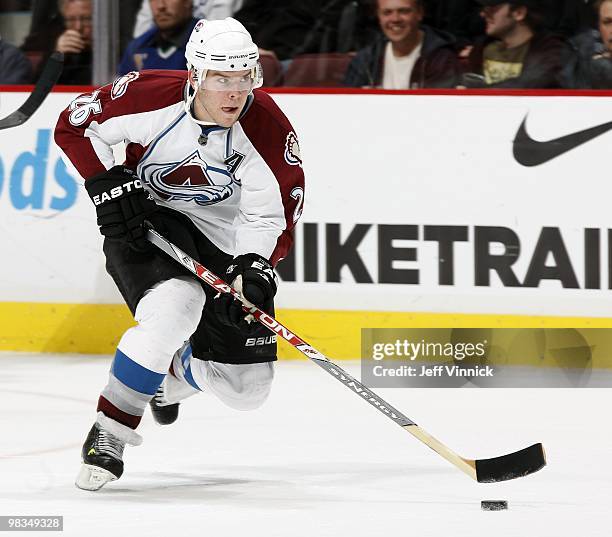 Paul Stastny of the Colorado Avalanche skates up ice with the puck during the game against the Vancouver Canucks at General Motors Place on April 6,...