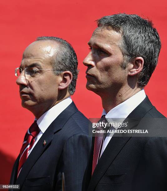 Norwegian Prime Minister Jens Stoltenberg and Mexican President Felipe Calderon take part in a welcome ceremony at Los Pinos Residence in Mexico...